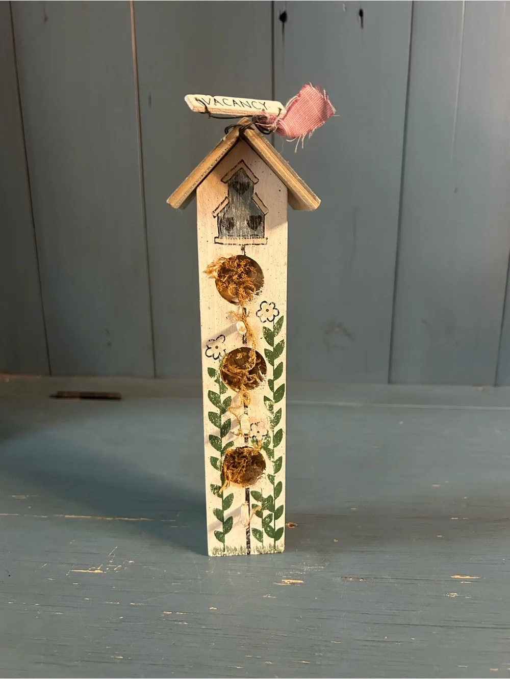 Hand Crafted White Birdhouse Wall Accent with Green Leaf and Pink Ribbon